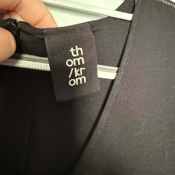 Thom Krom long sleeve jumpsuit in black minimalist attire comfort - Picture 2 of 9